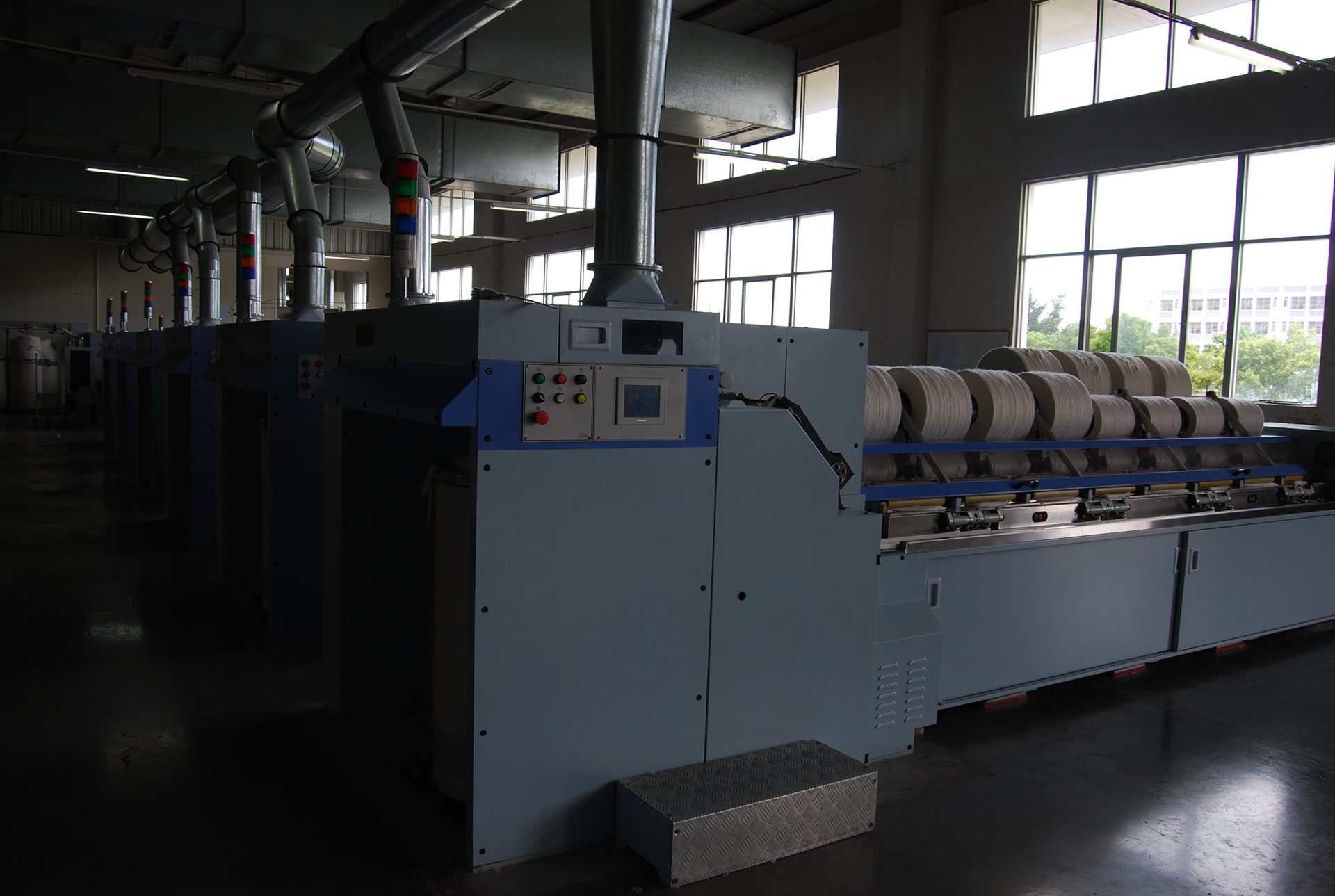 Carding and drawing machinery at the start of the yarn line