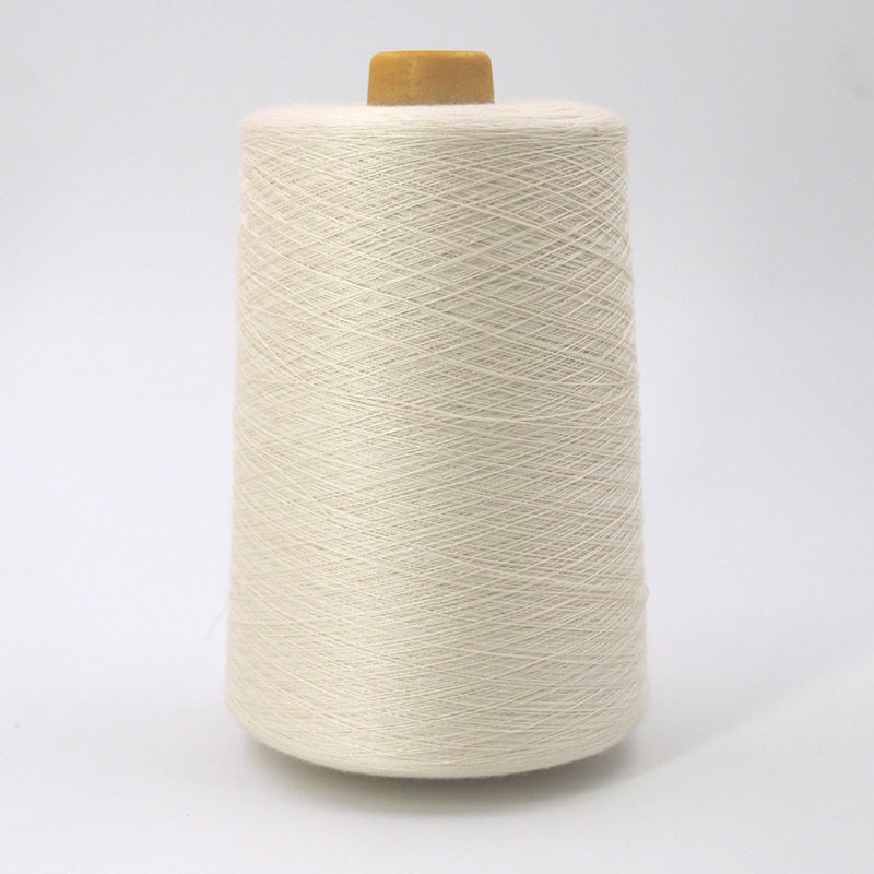 Modacrylic and cotton blend flame-resistant yarn cone